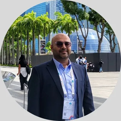 Asghar Ali Marfani in a navy blazer outdoors